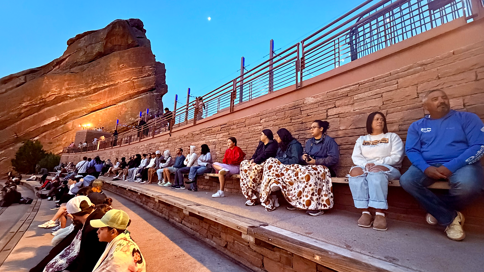 If you're visiting early morning, you'll notice many people choosing the first few rows closest to the top. They're often a little more protected from the breeze than the lower seating, and it is also easier to see the sunrise from that height. Photo credit: GreenSeaShells.com