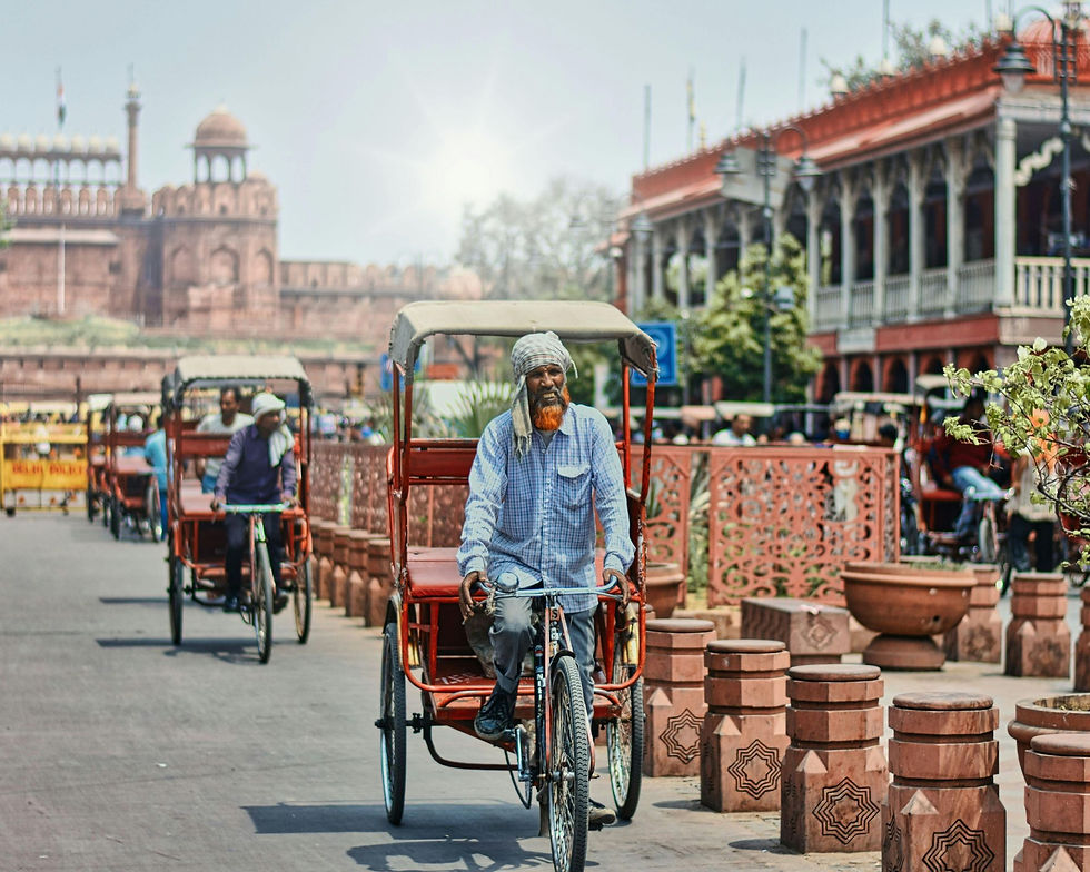 Tricycle Rickshaws Riding on a Street near Chandni Chowk Market, Delhi, India by Soubhagya Maharana