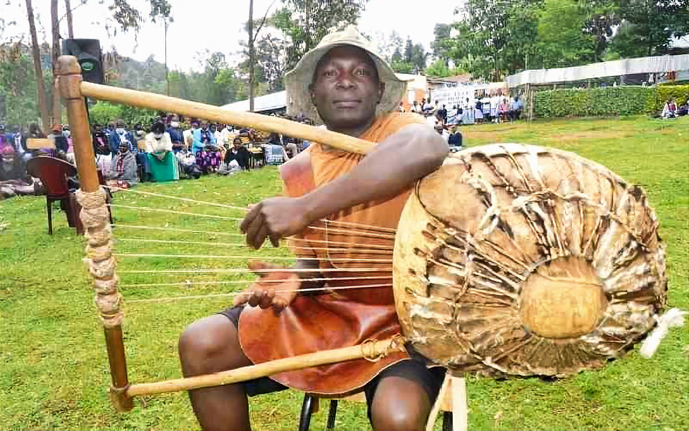 Man playing the Obokano. Photo credit: Annah Okero