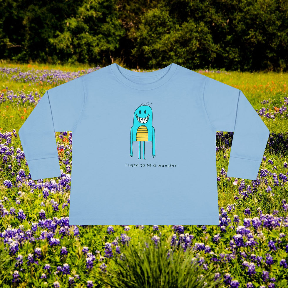 Thumbnail: Blue long-sleeve shirt with a cartoon monster, I wanted to be a monster, floral background