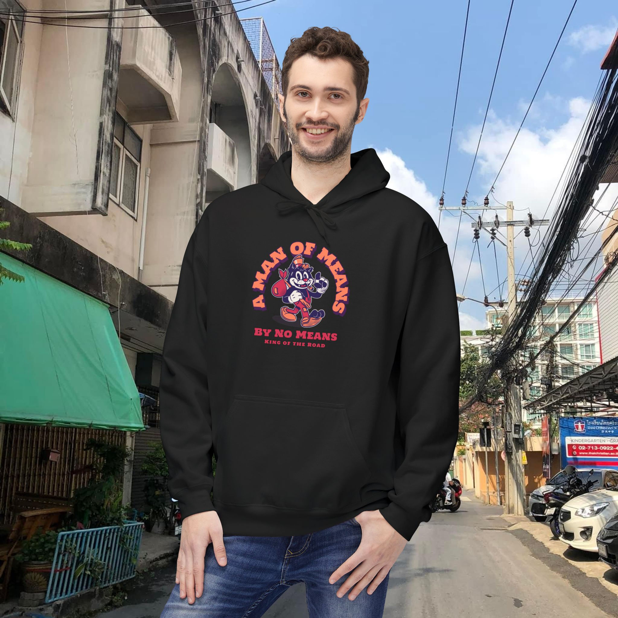 Man wearing black hoodie with text
