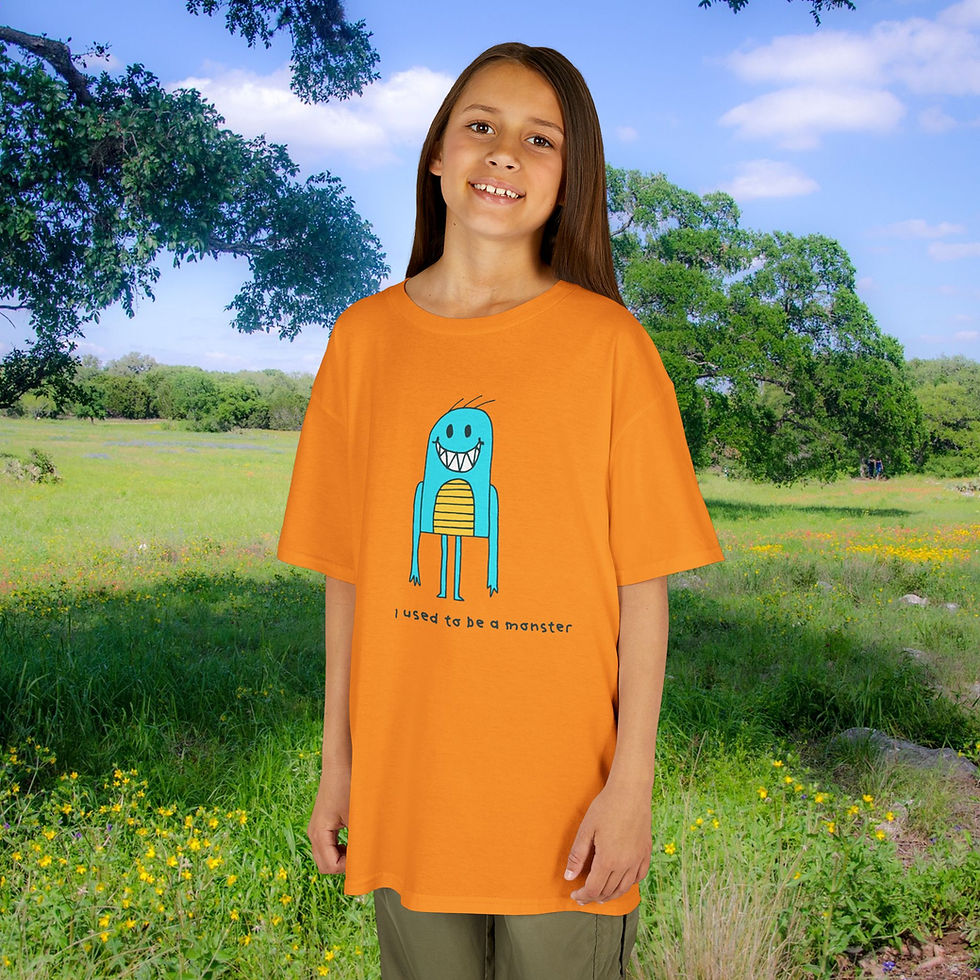 Young girl wearing orange shirt with cartoon text on scenic outdoor background