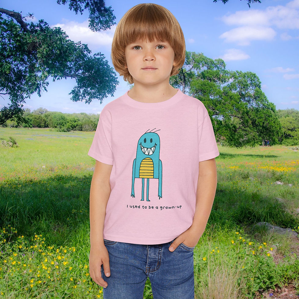 Thumbnail: Young child in pink shirt with monster graphic in the field.