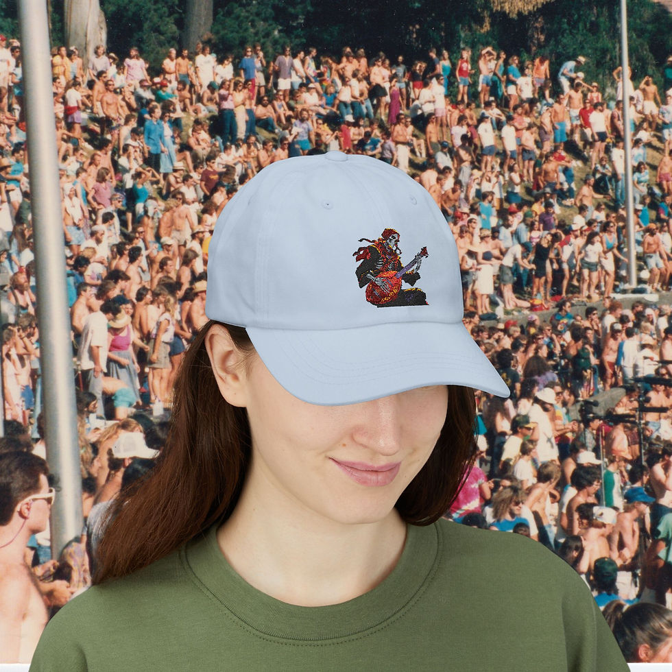 Thumbnail: Woman wearing a blue cap with a guitar design, crowd in background My Site 1