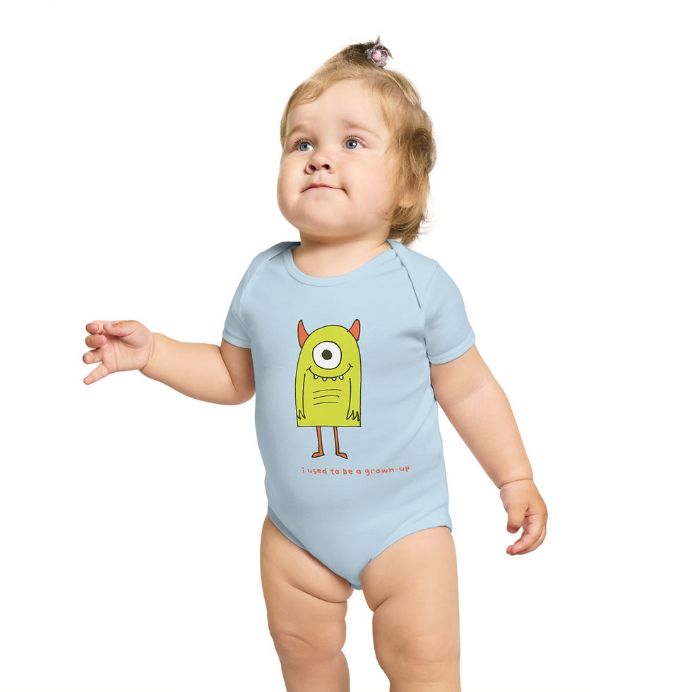 Thumbnail: Baby in light blue monster onesie looking up towards the light. 