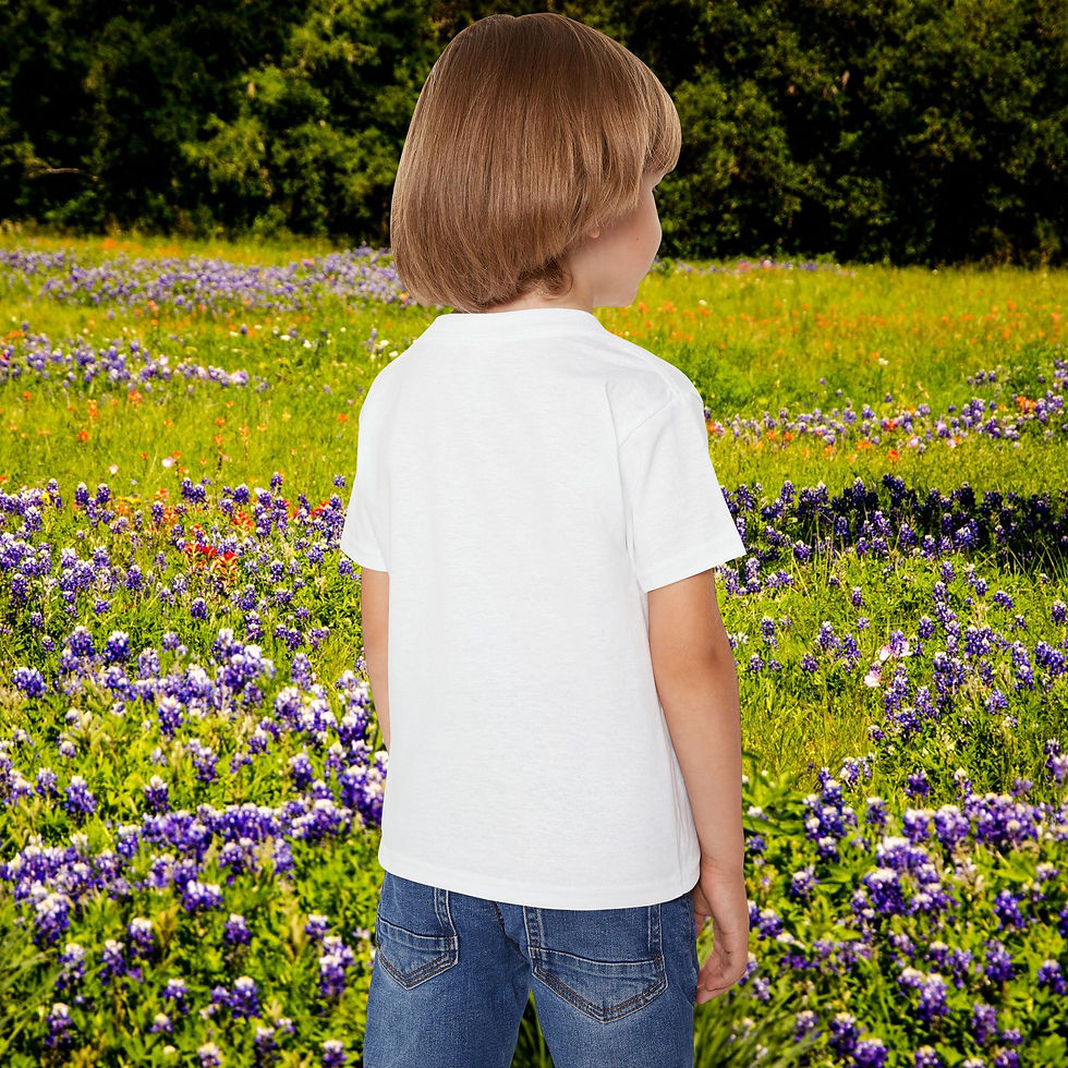 Thumbnail: Young child stands in a field of flowers, wearing a white shirt. Eco-Friendly Bag.
