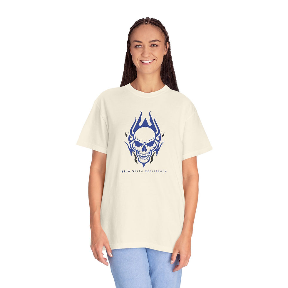 A woman wearing a beige t-shirt that has a blue flaming skull on the front, and the words "Blue State Resistance" under the skull.