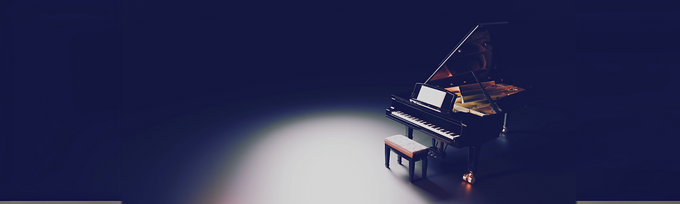 Grand piano on stage, ready for a performance.