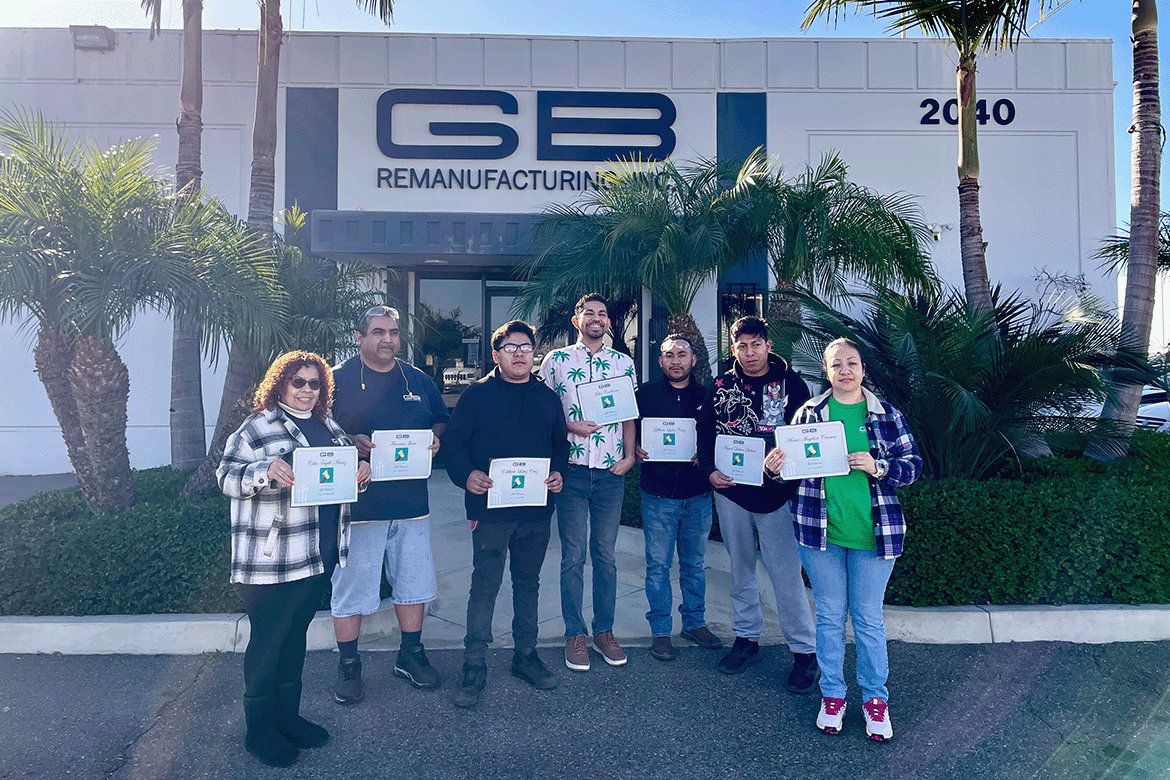 GB Reman's 12th Semi-Annual Top Performers are pictured holding their awards.