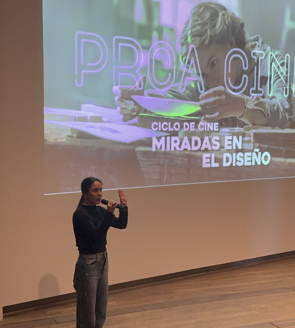 Ana Carrino presents films at Fundación PROA in front of a screen