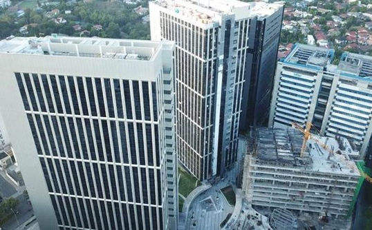 Filinvest Axis Tower Two is a 25-storey Grade A office building in Filinvest City, Alabang, offering office spaces for rent and lease in Northgate Cyberzone. Each floor provides 2,070.55 sqm of leasable space with a bare shell handover condition, ideal for BPO, IT, and corporate tenants. PEZA-accredited and LEED Gold-certified, the tower features a Turnstile with Destination Oriented Allocation System (DOAS), sustainable architecture, and modern facilities. Prime office for rent in Alabang business district near major transport routes and commercial hubs.