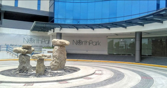 North Park Building in Mandaue City, Cebu is a modern PEZA-accredited office building strategically located along UN Avenue. Completed in 2016, it offers efficient floor plates of approximately 2,313 square meters ideal for BPOs, multinational companies, and local enterprises. The building is equipped with 2 passenger elevators, 1 service elevator, basement and 2nd floor parking, and 100% backup power to support uninterrupted business operations. Ground floor retail spaces provide added convenience for tenants and nearby communities, making it a prime choice for office space leasing in Cebu.