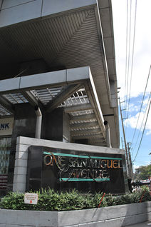 Premium office building One San Miguel Avenue in Ortigas Center Pasig City by Amberland Corporation, offering modern office spaces for rent or sale.
