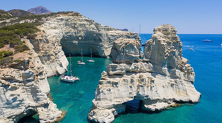 yacht caves_at_Kleftiko_on_Milos_Island_Greece