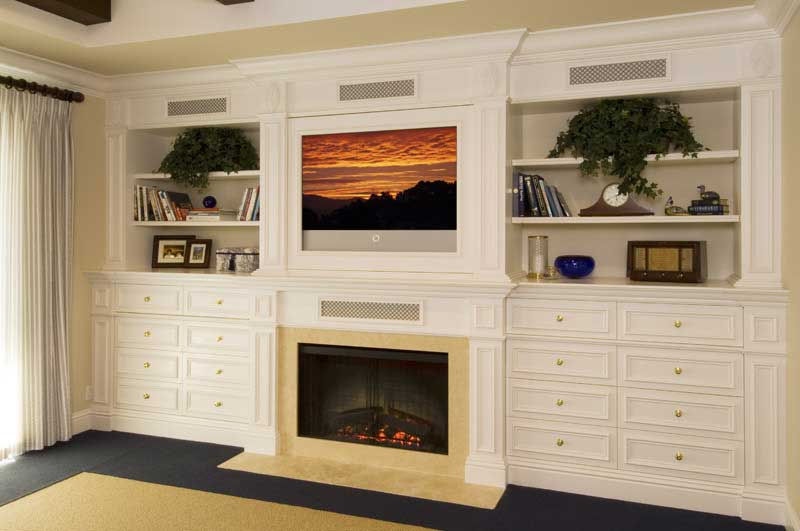 master bedroom real wood tv fireplace custom hidden audio/vidual