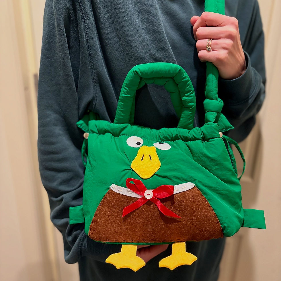 Thumbnail: The Quack Pack Puffer Bag