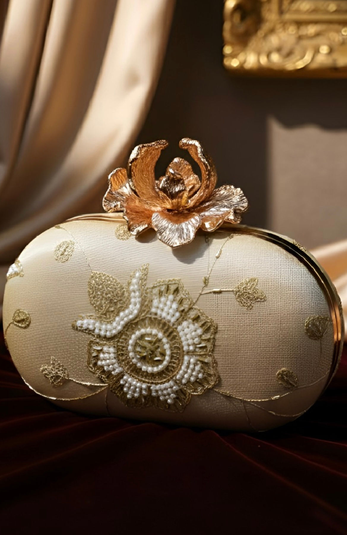 Gold embroidered clutch
