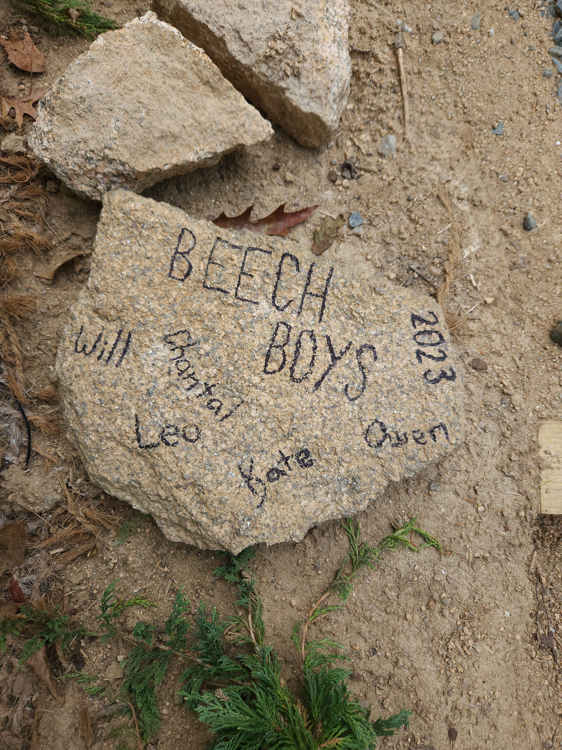 Beech Boys sign a rock, which can be found at the begging of the stairs. Signed: Will, Chantal, Leo, Kate, Owen, 2023