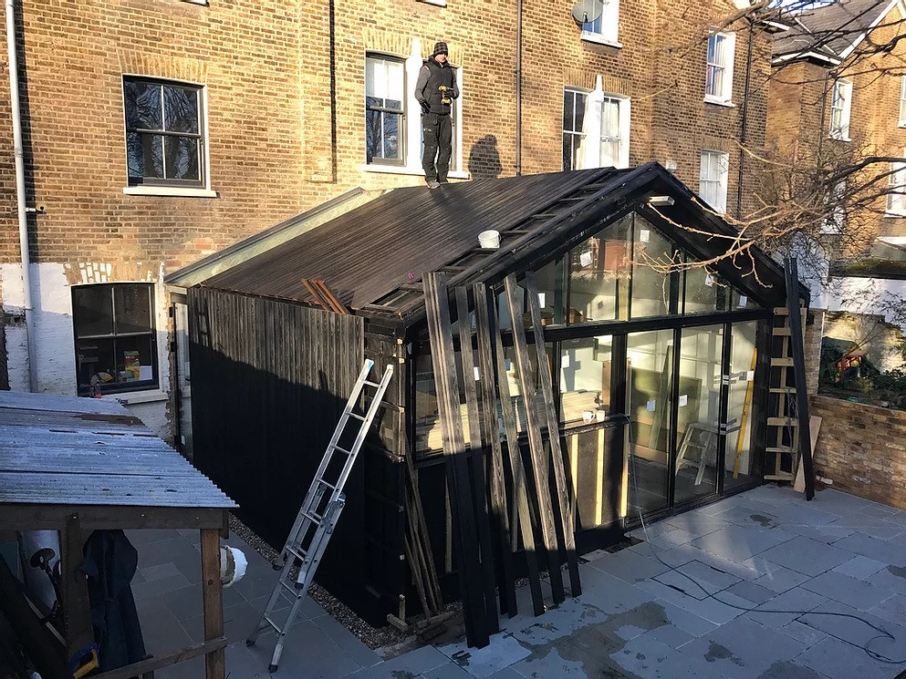 cladding; burnt cladding; timber cladding; charred timber; charred cladding; cladding installation