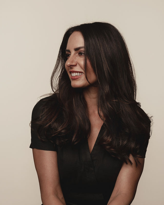 Smiling Cincinnati, Ohio hairstylist named Angela
