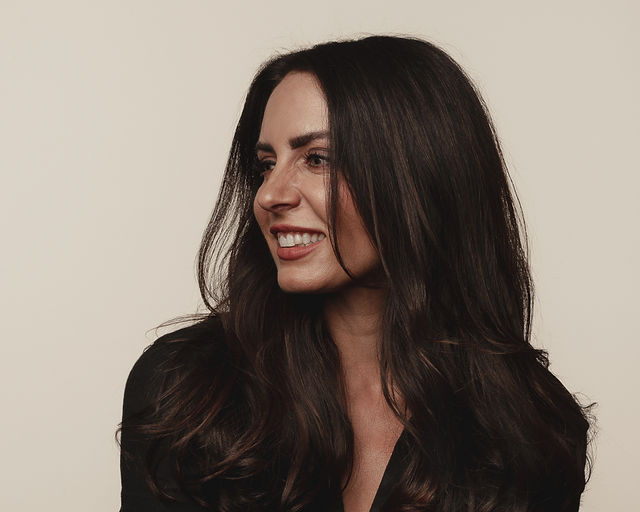 Smiling Cincinnati, Ohio hairstylist named Angela