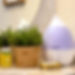AURORA humidifier on a bathroom counter.