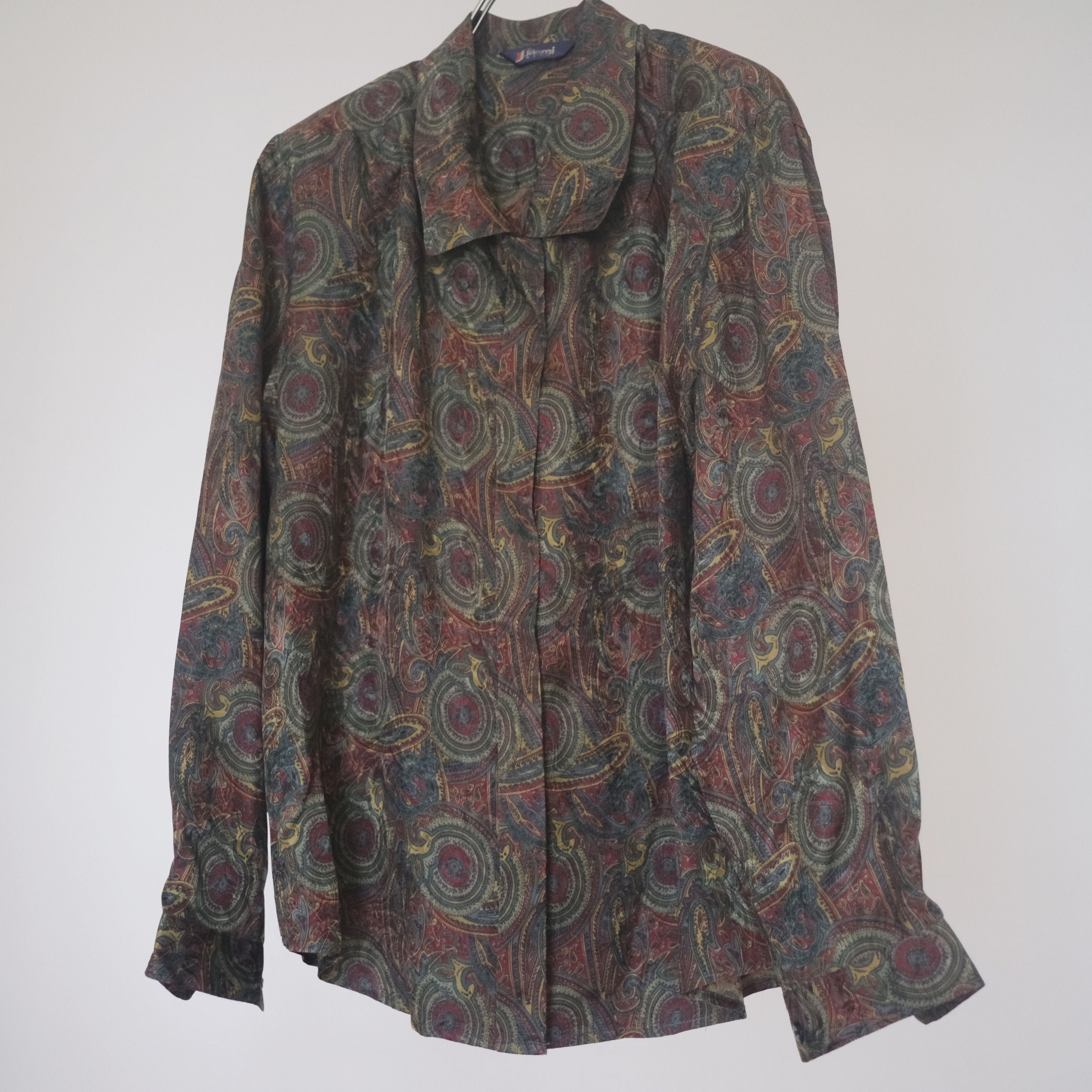 maroon and green printed top