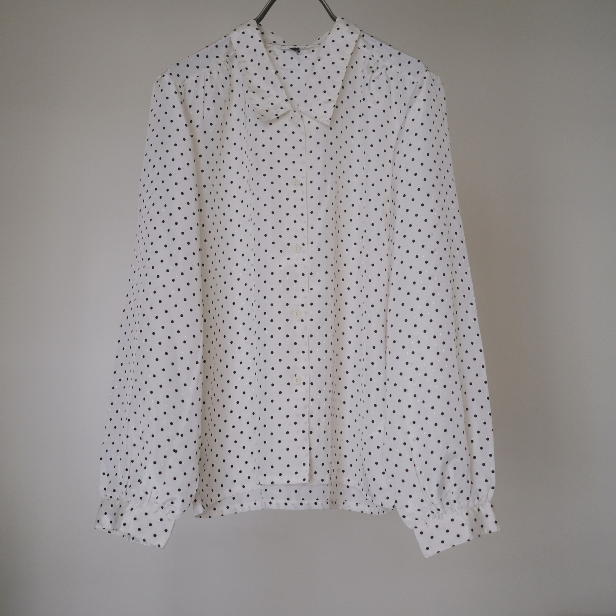black and white polka dots top