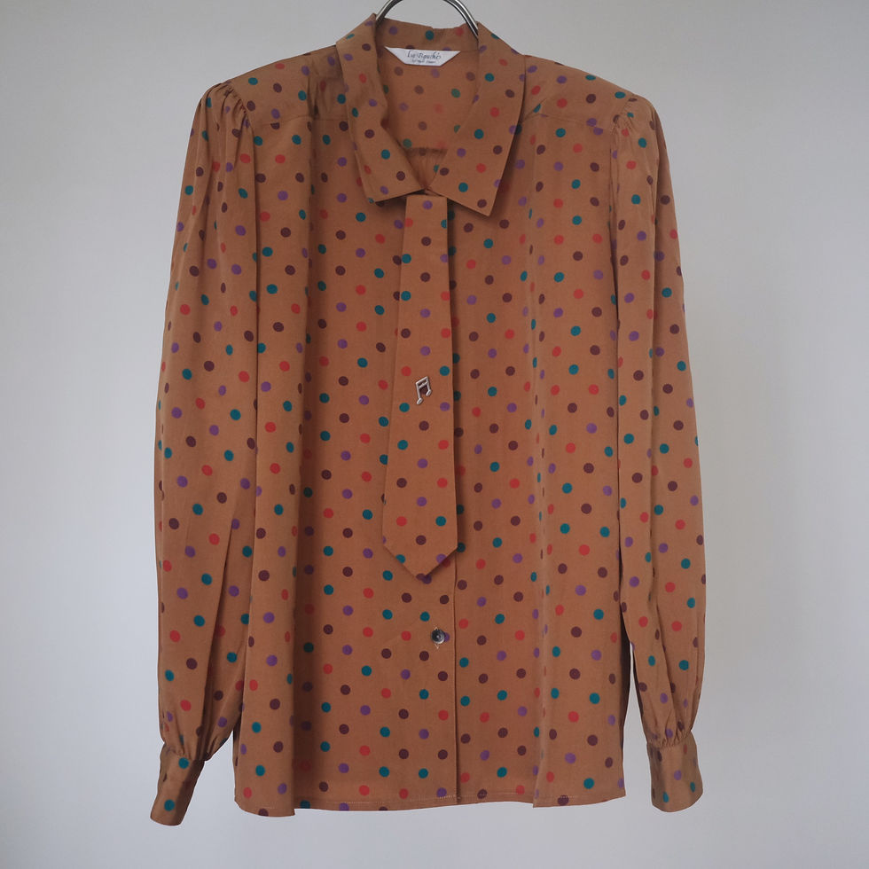 Thumbnail: tan polka dots top