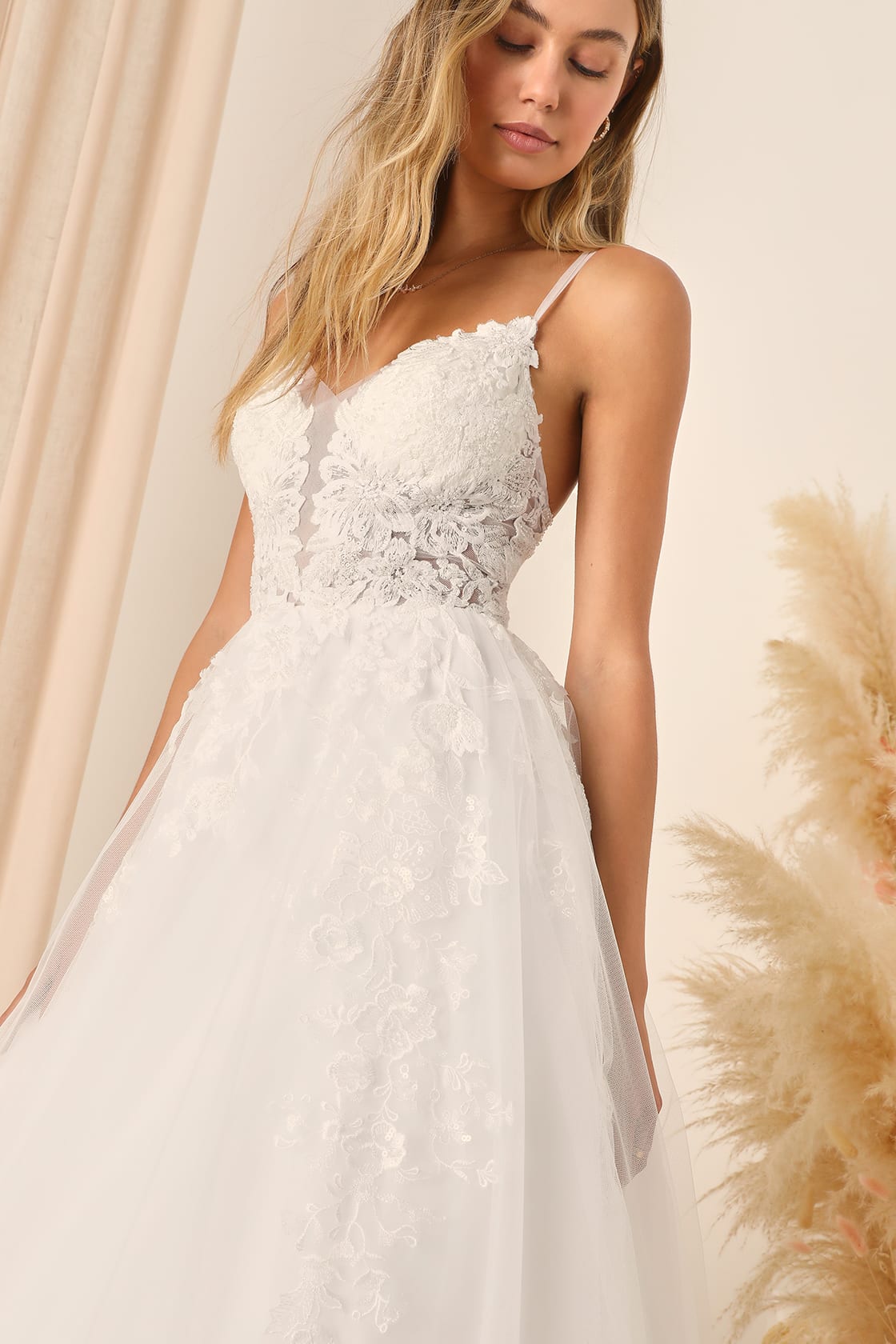 Contemporary modern ball gown wedding dress by Lulu's, blending traditional and innovative design elements.