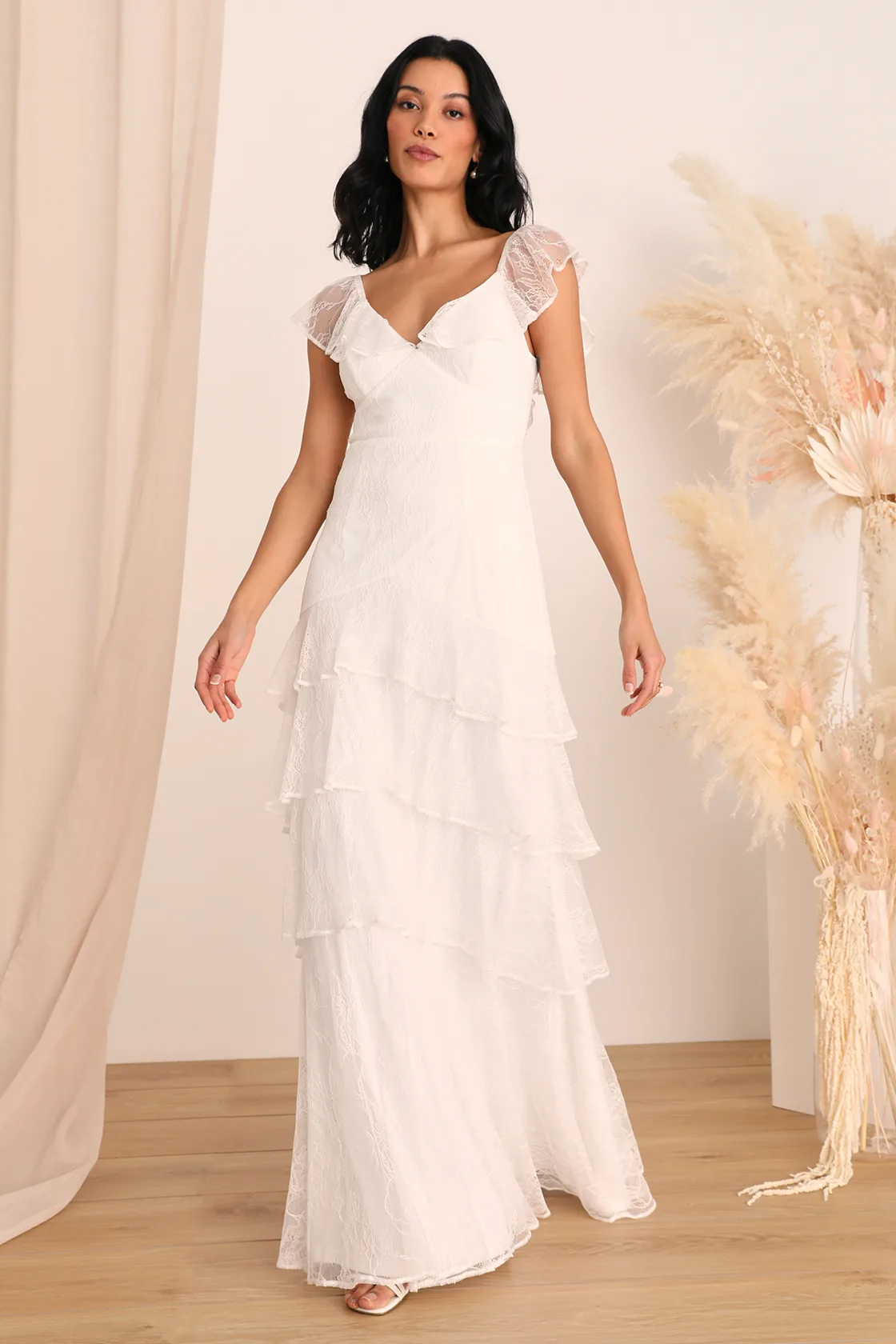 Enchanting wedding dress with ethereal layers, evoking a dreamy and flowing bridal look from Lulu's.