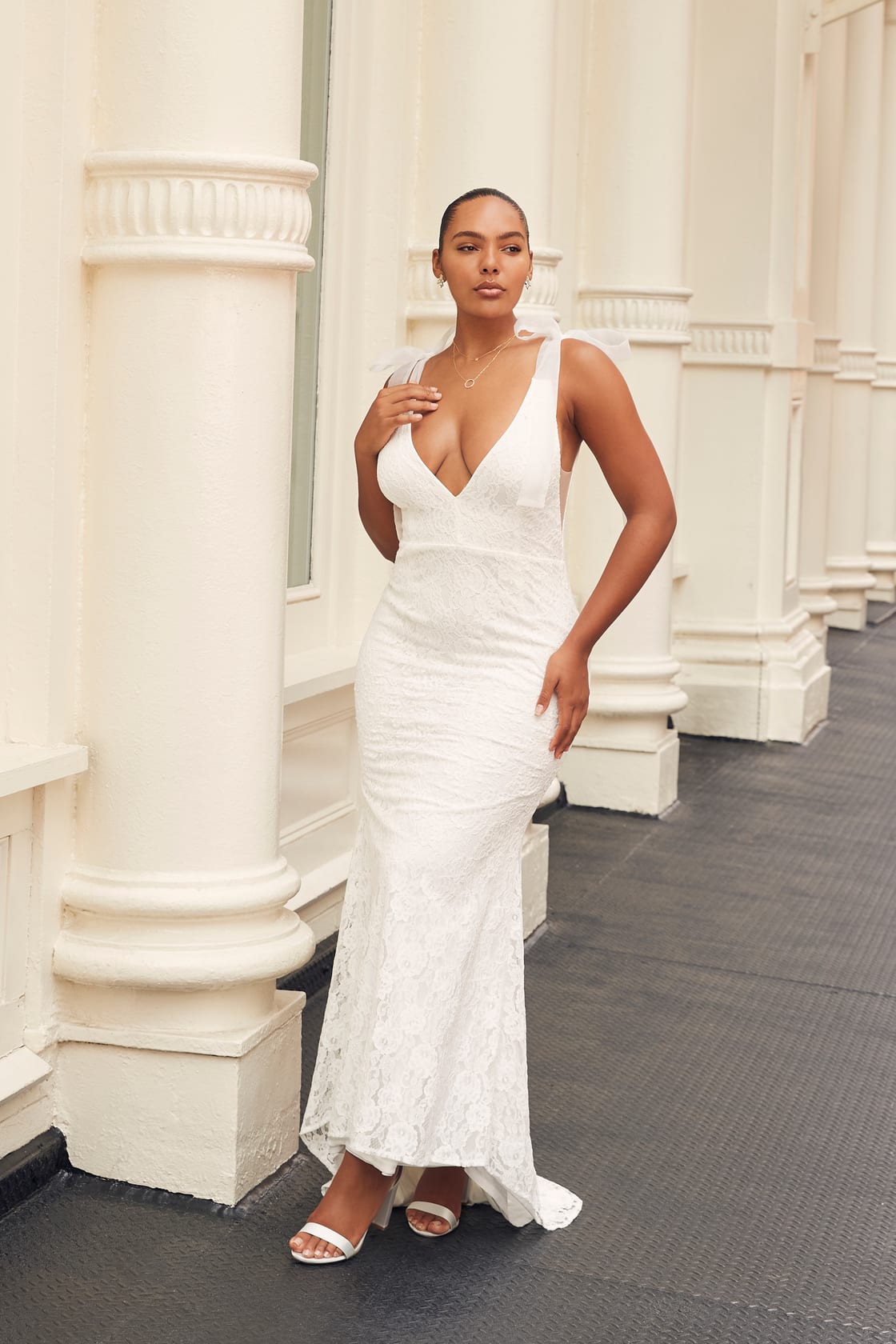 Exquisite wedding dress adorned with timeless lace, a symbol of romance and elegance by Lulu's.
