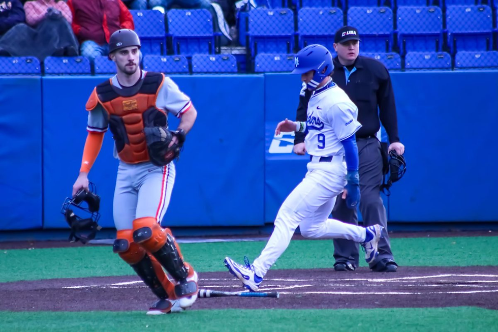 Eston Snider steps on home plate to score a run against Bowling Green at Reese Smith Jr. Field on 2-14-25. Photo by Ephraim Rodenbach