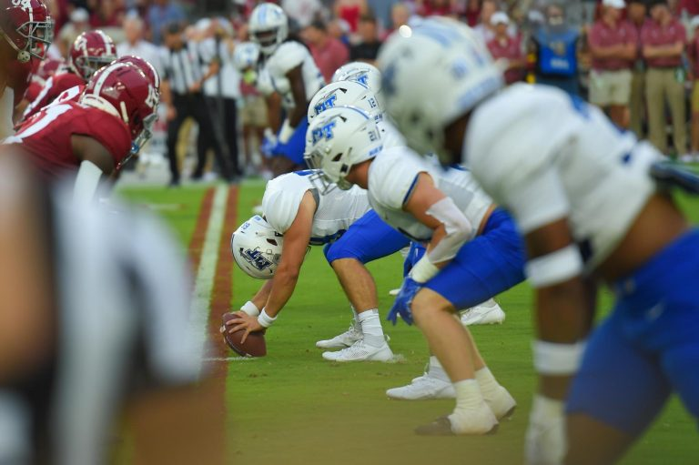 Brody Butler prepares to snap in a game against No. 4 Alabama at Bryant-Denny Stadium on Sept. 2, 2023. Photo C/O Butler Family