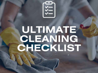 Yellow cleaning glove cleaning a countertop