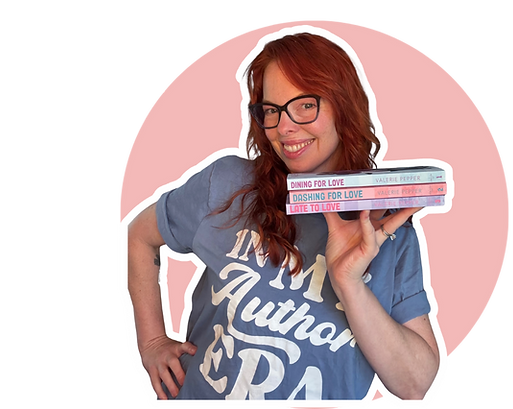 An image of the author holding a stack of books like a server