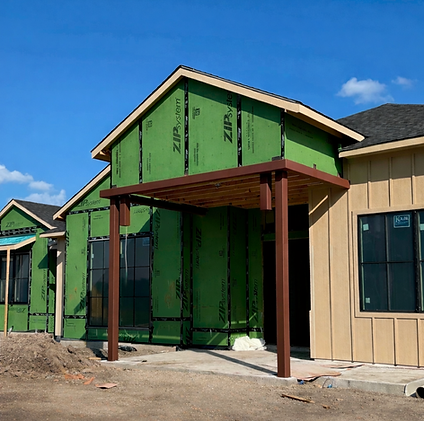New build house being constructed. Showing the structural steel components for an entryway