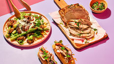 Plated dishes made with Naturalaz sous vide pork, including sliced pork carvery, a warm asparagus salad, crostini topped with pork, and a small bowl of chimichurri sauce.