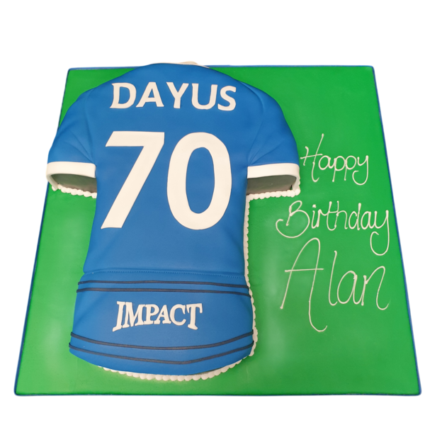 A beautifully decorated celebration cake with a colourful and intricate design, perfect for a special occasion or treat.