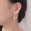 Thumbnail: Dangled Selah Crystal Hoop Earrings