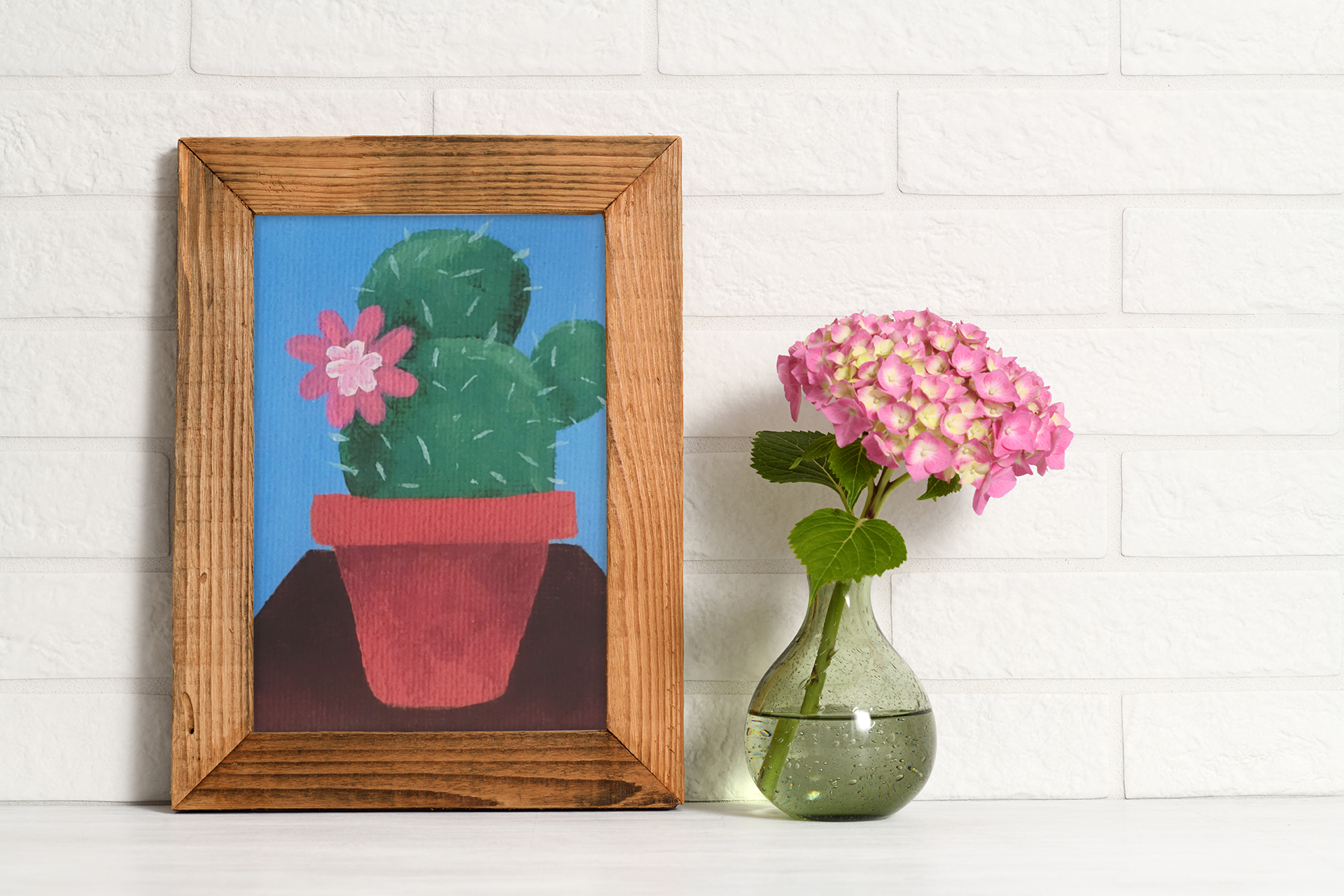 cactus print in picture frame
