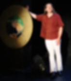 Performer singing on stage at Wohlfahrt Haus Dinner Theatre