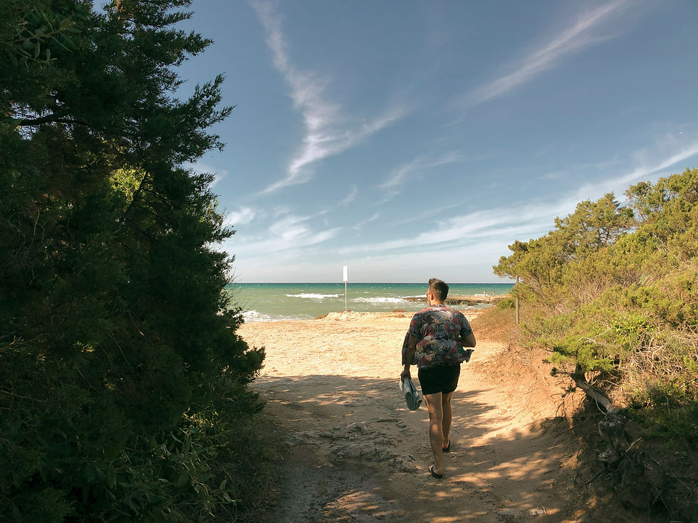 The best beach hotels in Puglia Italy - read the full guide to Puglia's stunning Adriatic coastline and best places to stay. Pictured is the beach at Torre Pozella