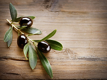 Olives on Wood Background