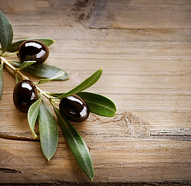 Olives on Wood Background