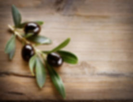Olives on Wood Background