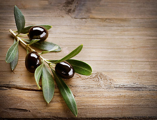 Olives on Wood Background