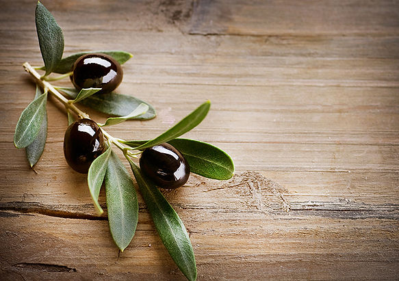 Olives on Wood Background