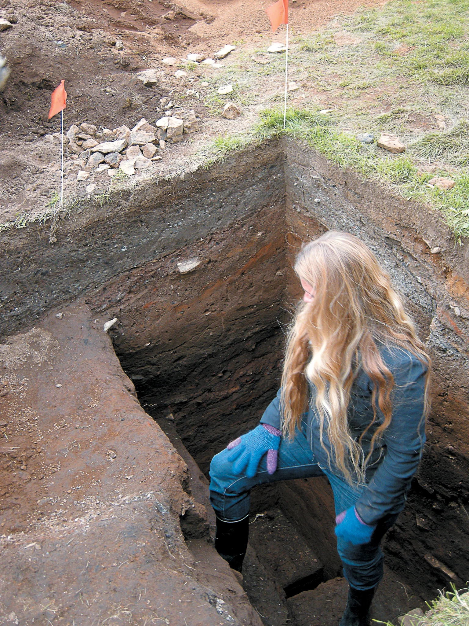 Michèle Hayeur Smith examines archaeological deposits at Gilsbakki spanning 1,000 years—from the early 10th century to the early 20th century. Credit: © Kevin Philbrook Smith, 2009