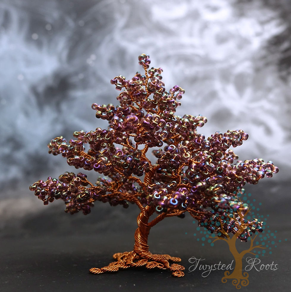 Thumbnail: Purple and copper bead and wire tree sculpture